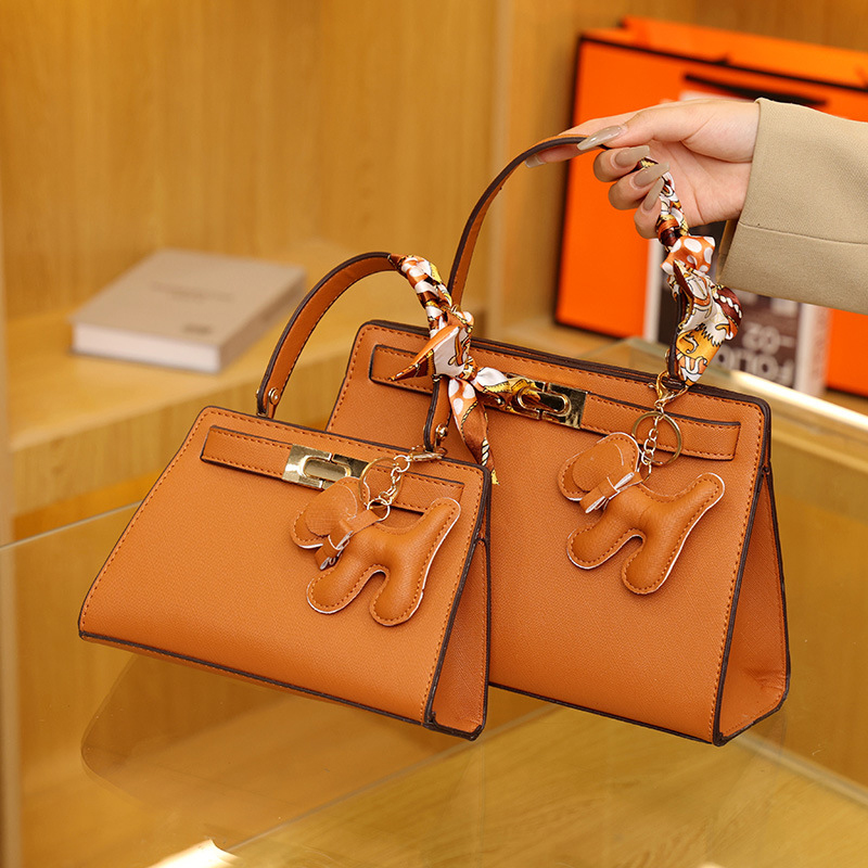 New Senior Luxury Women's Handbag High End Brand Leather Designer Shoulder Bag Lady With Cute Pendant Orange Color Crossbody Bag