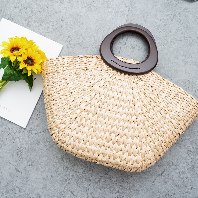Retro simple handmade straw bag Summer new Portable hand bag Women's holiday casual bag