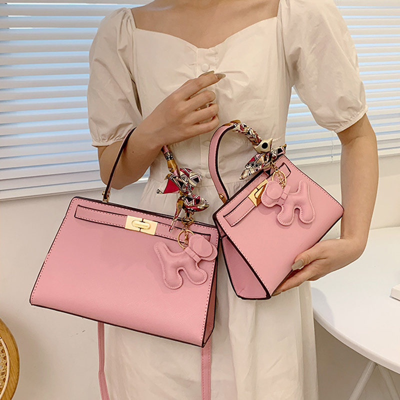 New Senior Luxury Women's Handbag High End Brand Leather Designer Shoulder Bag Lady With Cute Pendant Orange Color Crossbody Bag