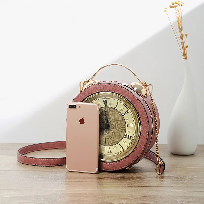Modeling Of Small Round Bell With Individual Chain In The New Kind Of Women's Bag Hand-held Slant Bag Clock Bag In