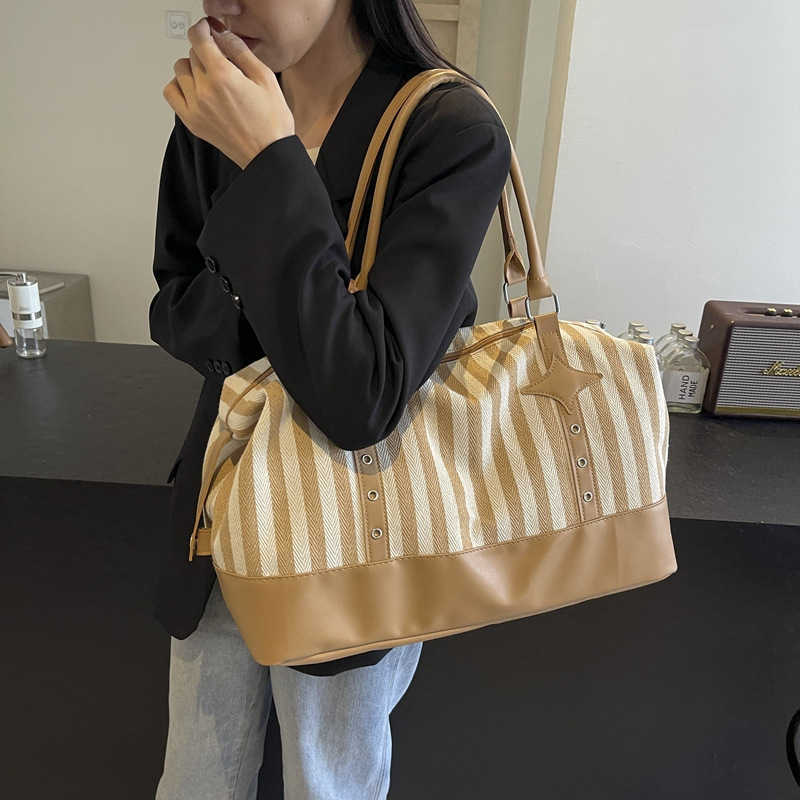 Fashion striped casual yoga bag for women, Korean version, trendy sports and fitness bag, short distance business trip, boarding travel bag 241107