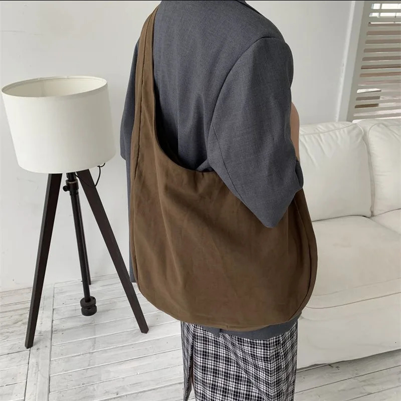 Large capacity dumpling shoulder bag womens canvas cross body bag retro fashion homeless messenger bag solid color womens handbag 241106