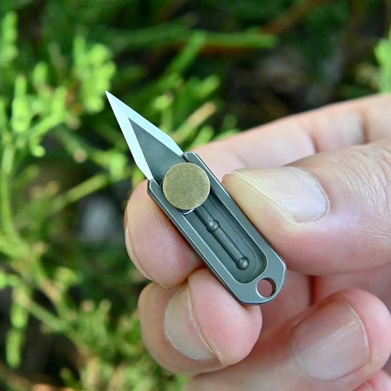 Pure titanium mini push knife titanium alloy sharp portable Edc keychain pendant quick opening upon unboxing X241107