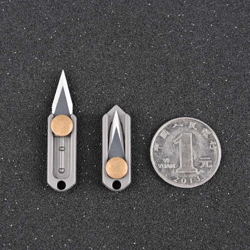 Pure titanium mini push knife titanium alloy sharp portable Edc keychain pendant quick opening upon unboxing X241107