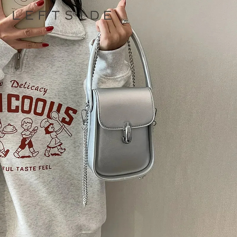 Mini chain cute PU leather cross shaped bag with short handle suitable for womens solid color fashion mobile handbags and wallets 241107