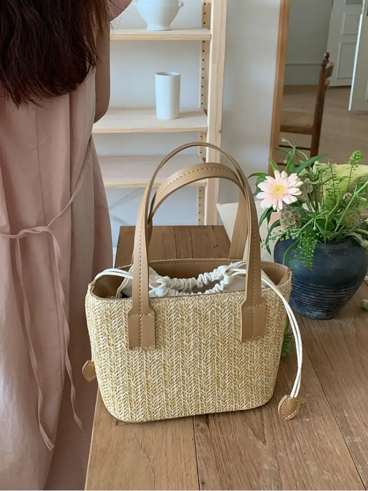 2023 Women's Leisure Grass Woven Handbag Drawstring Bucket One Shoulder Crossbody Bag Women's Travel Bohemian Vacation Beach Bag