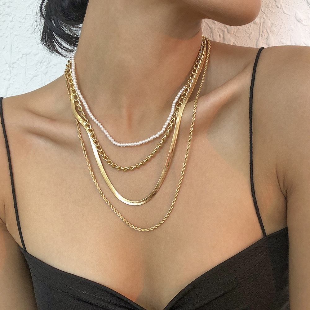 Cold Wind Multi layer Pearl Stacked Necklace for Women with European and American Style Cross border Metallic Texture Retro Snake Chain Personalized Necklace