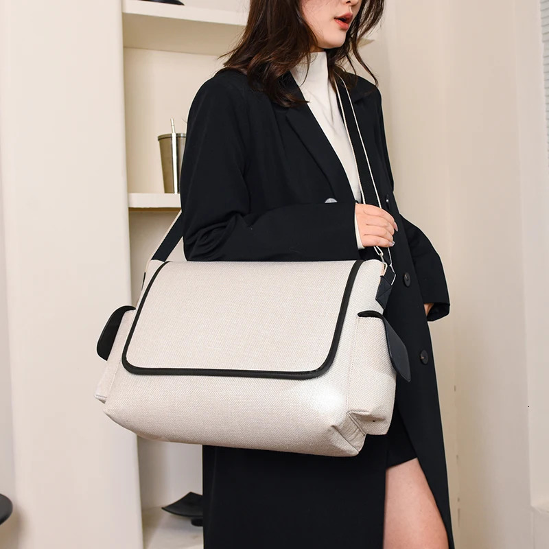 2025S New Free Shipping Designer Bag Womens Canvas Large Capacity Casual Shoulder Bag Messenger Handbag