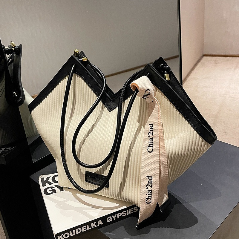 New Design Fashion Stripped Women's Shoulder Bags Tote Bag Korean Style Solid Color Bucket for Student Autumn New Handbags 2024
