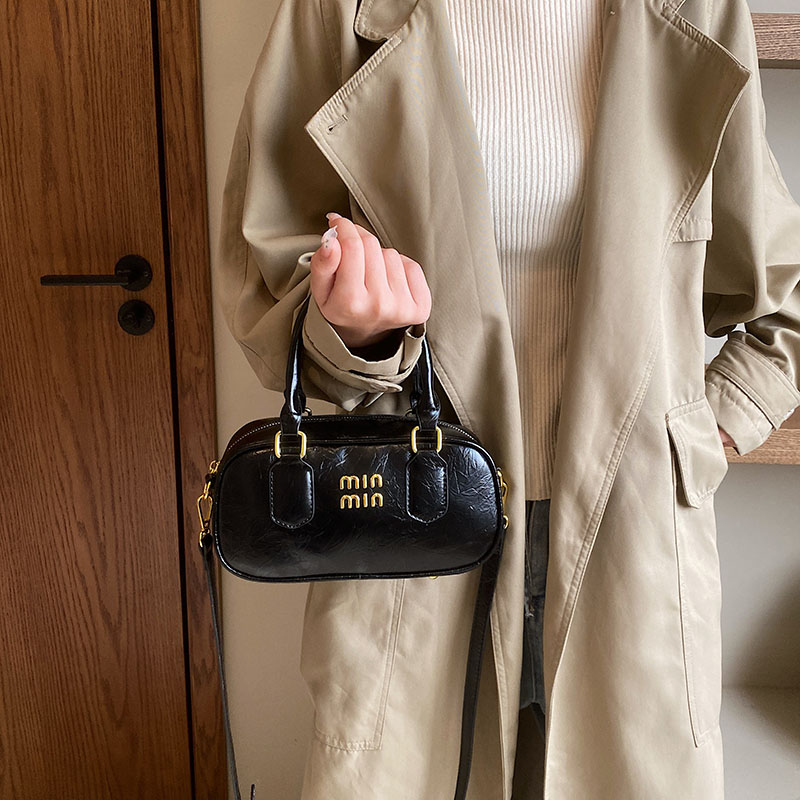 2024 New Trend Fashion Retro Women's PU Leather Hand Bowling Bag Simple Casual versatile Commuting Single Shoulder Crossbody Bag
