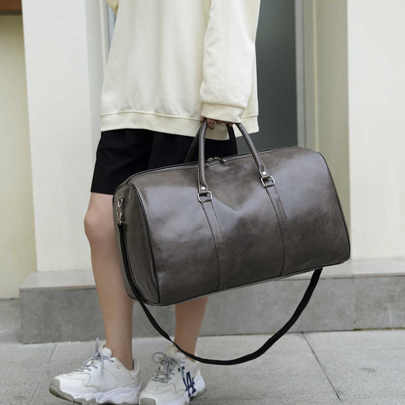 New minimalist PU high-end travel bag, men's fashion, solid color texture, waterproof luggage bag, travel shoulder tote bag 241107