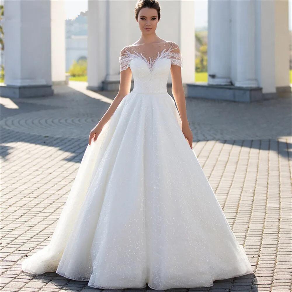 Modern A-Line Wedding Dresses Cape Sleeves V Neck Hollow Lace Appliqued Sequins Floor Length Hollow Backless Shiiny Tulle Lace Plus Size Boho Wedding 
