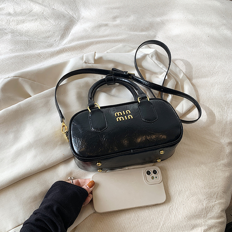 2024 New Trend Fashion Retro Women's PU Leather Hand Bowling Bag Simple Casual versatile Commuting Single Shoulder Crossbody Bag