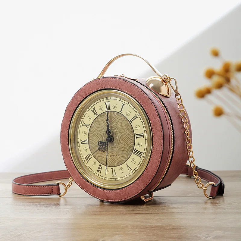 Modeling Of Small Round Bell With Individual Chain In The New Kind Of Women's Bag Hand-held Slant Bag Clock Bag In