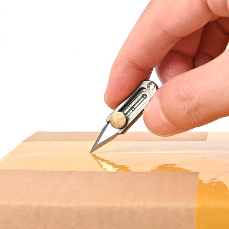 Pure titanium mini push knife titanium alloy sharp portable Edc keychain pendant quick opening upon unboxing X241107