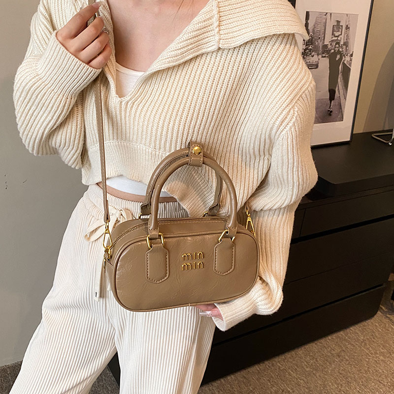2024 New Trend Fashion Retro Women's PU Leather Hand Bowling Bag Simple Casual versatile Commuting Single Shoulder Crossbody Bag
