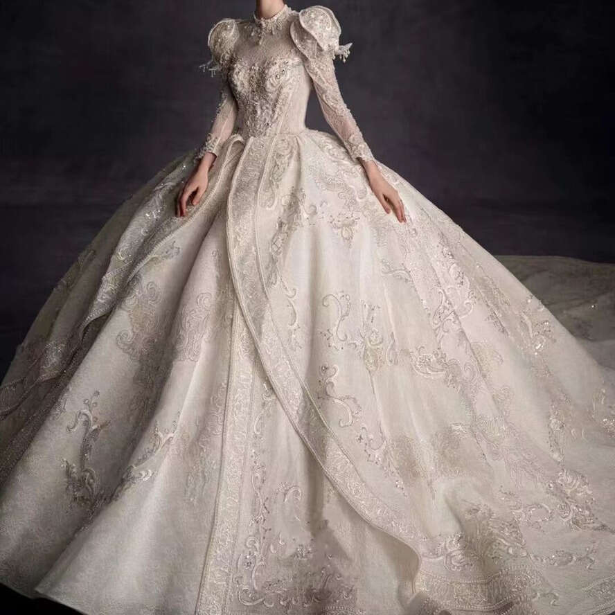 Custom Made Ball Gown Wedding Dresses Glitter Dubai Arabia Jewel Long Sleeves Beads Appliqued Crystal Bridal Gowns Real Images