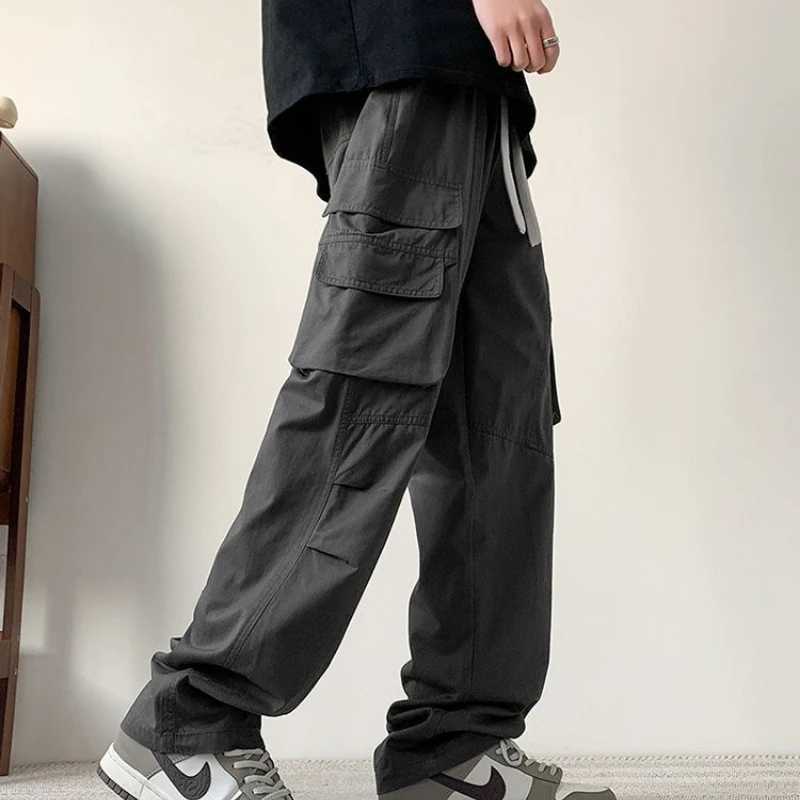 Spring Autumn New Fashion Elastic Waist Drawstring Solid Mens Clothing Casual Pocket Straight Trend Korean Loose Cargo Pants LX241107