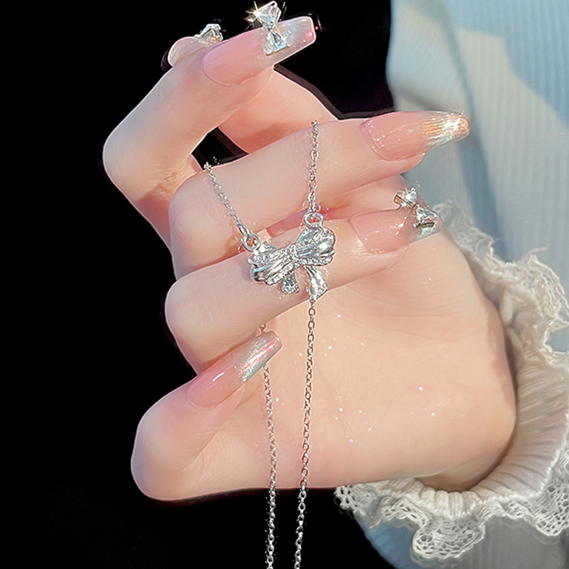 Elegant Women's Jewelry: Original Designer Christmas Series Necklace with Shimmering Bowknot