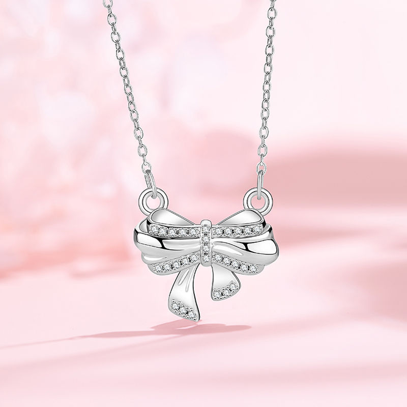 Elegant Women's Jewelry: Original Designer Christmas Series Necklace with Shimmering Bowknot