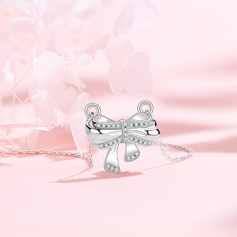 Elegant Women's Jewelry: Original Designer Christmas Series Necklace with Shimmering Bowknot