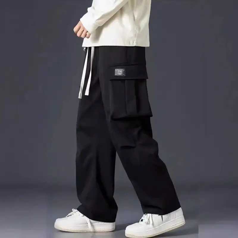 Spring Autumn Solid Color Fashion Elastic Waist Straight Pants Man High Street Casual Loose Pockets Patchwork Drawstring Pants LX241107