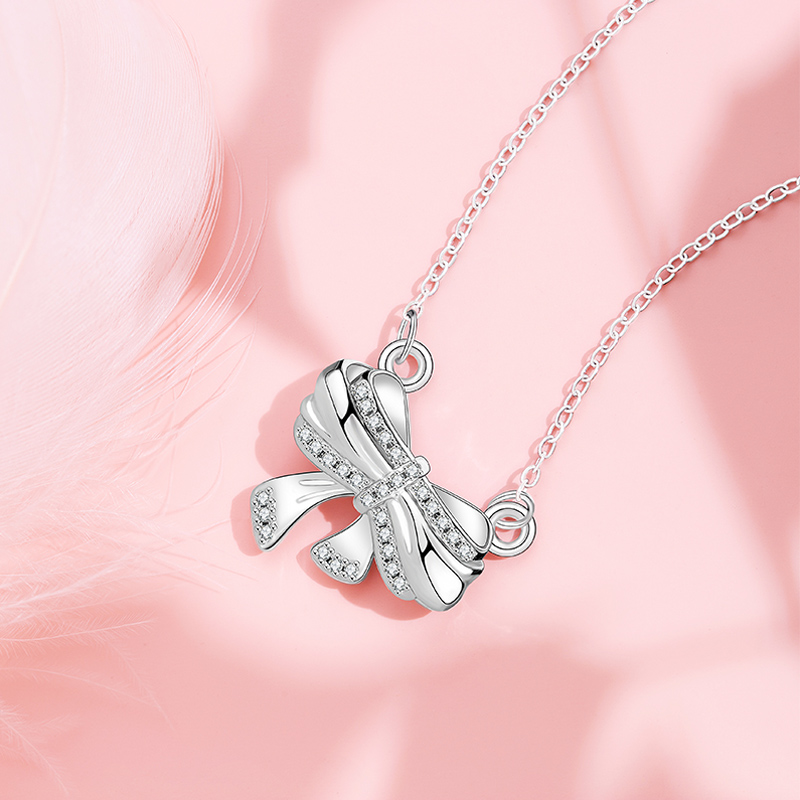 Elegant Women's Jewelry: Original Designer Christmas Series Necklace with Shimmering Bowknot
