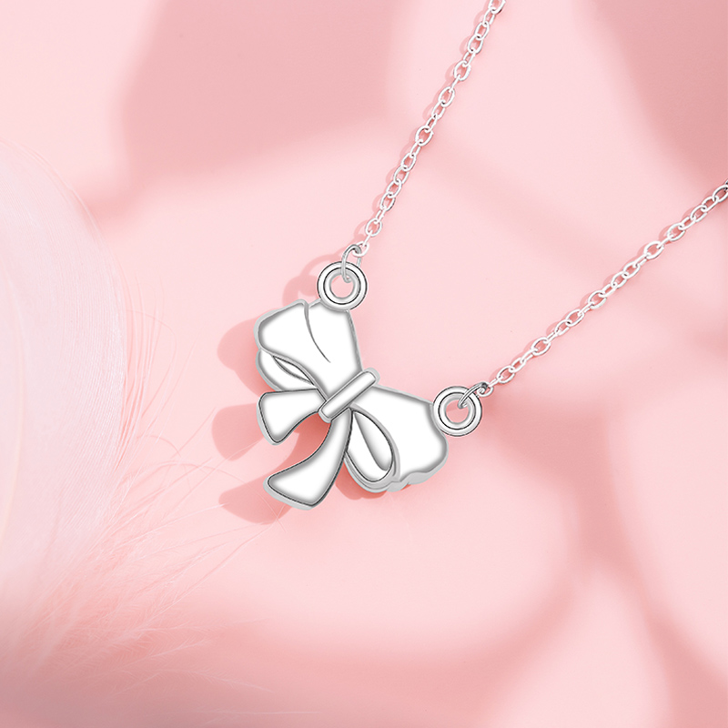 Elegant Women's Jewelry: Original Designer Christmas Series Necklace with Shimmering Bowknot