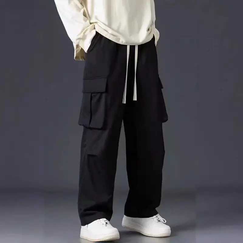 Spring Autumn Solid Color Fashion Elastic Waist Straight Pants Man High Street Casual Loose Pockets Patchwork Drawstring Pants LX241107