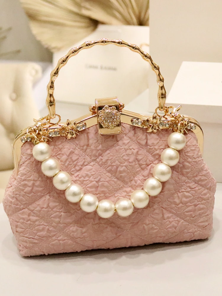 Fashion and elegance, celebrity temperament pearl autumn new trend women's bag, one shoulder portable messenger