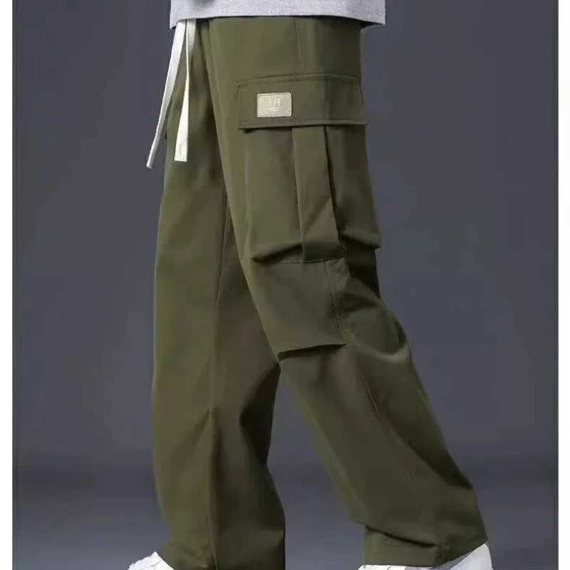 Spring Autumn Solid Color Fashion Elastic Waist Straight Pants Man High Street Casual Loose Pockets Patchwork Drawstring Pants LX241107