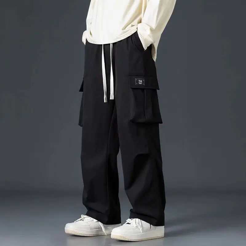 Spring Autumn Solid Color Fashion Elastic Waist Straight Pants Man High Street Casual Loose Pockets Patchwork Drawstring Pants LX241107