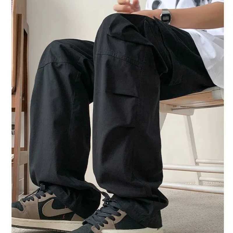 Spring Autumn New Fashion Elastic Waist Drawstring Solid Mens Clothing Casual Pocket Straight Trend Korean Loose Cargo Pants LX241107