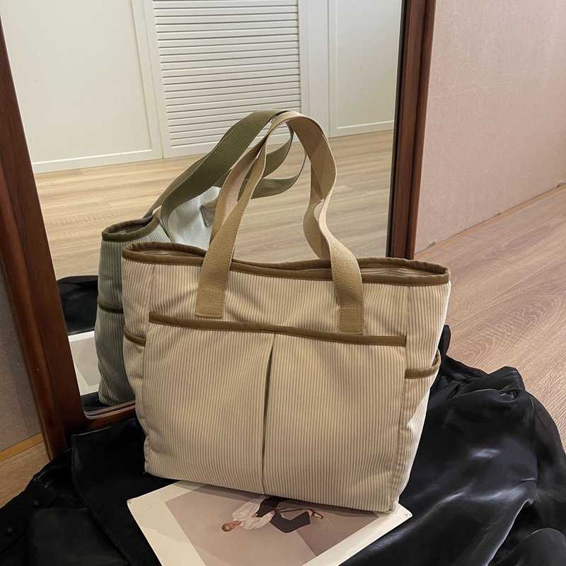 Large capacity high-quality fabric bag for women, new model for students, versatile commuting bag for class, casual shoulder tote bag