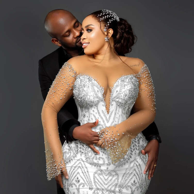2024 Arabic Aso Ebi Plus Size Urious White Mermaid Wedding Dresses Beaded Crystals Sheer Neck Bridal Gowns Dress