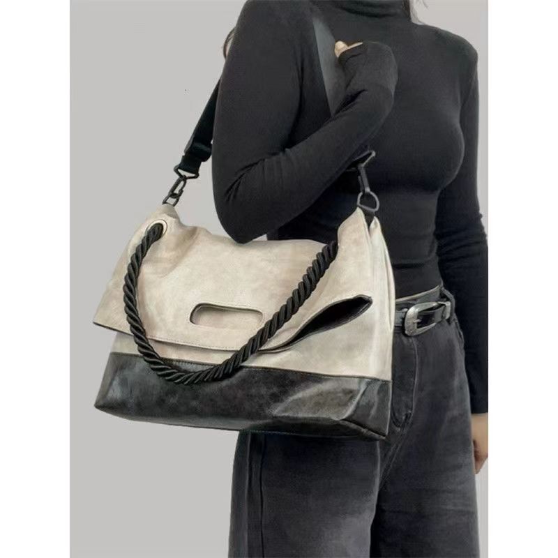 New A4 Level Women's Niche Soft Leather Can Accommodate Cross Body Commuting Designer Bag