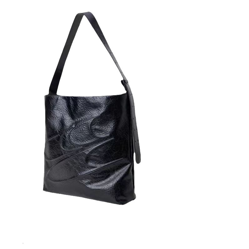 2025S Designer Large Capacity for Women Simple Soft Leather Single Underarm Bag Tongqin Cross Shoulder Oil Wax Bag