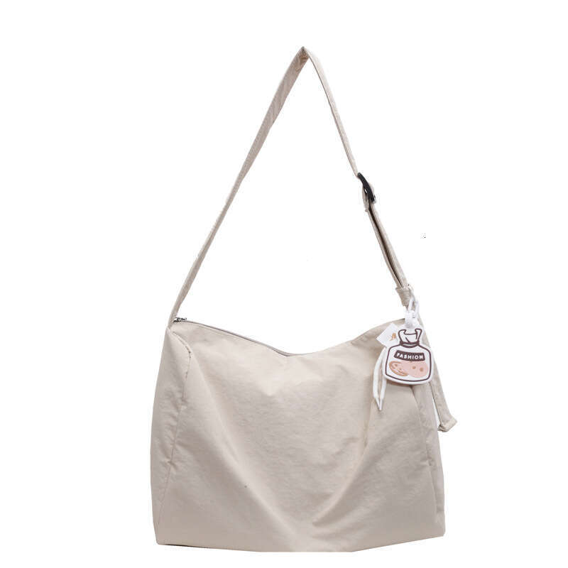 Korean girl lazy single shoulder tote with large capacity and versatile commuting for college students, Sen style hand-held armpit bag