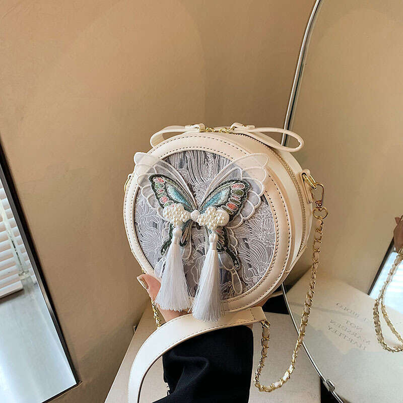 Fashionable versatile Chinese style small for women's 2024 autumn and winter new butterfly knot round cake texture chain shoulder bag