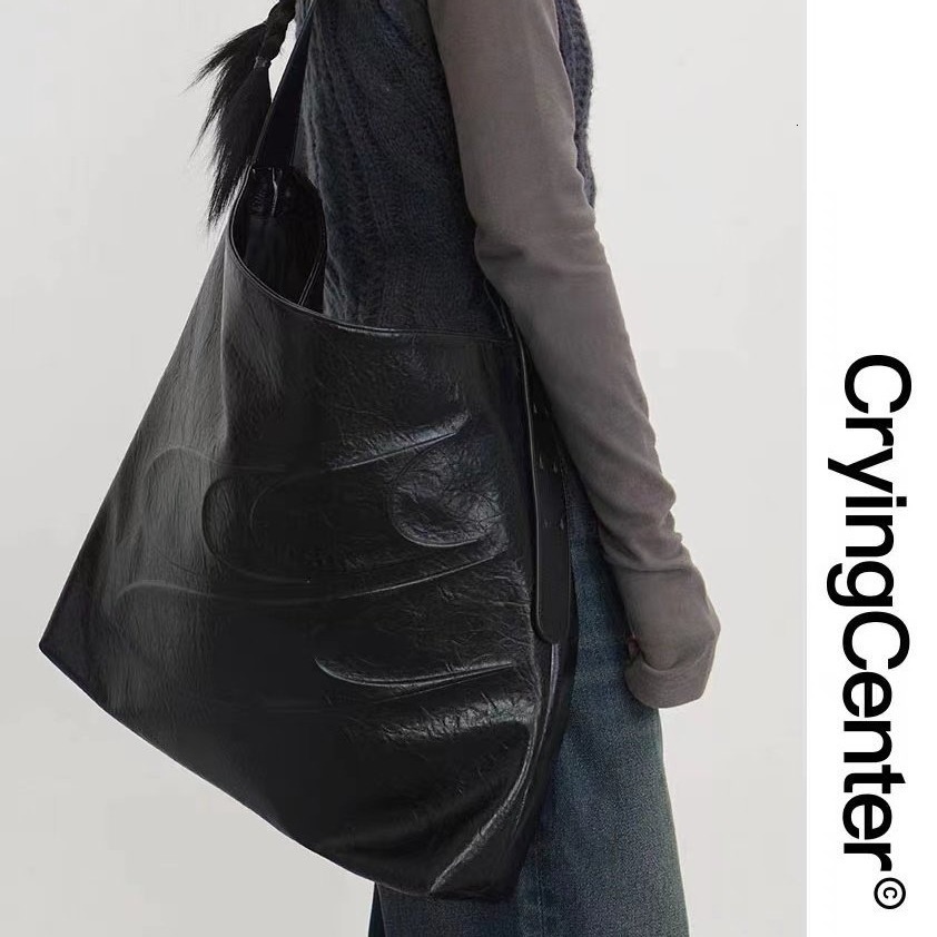 2025S Designer Large Capacity for Women Simple Soft Leather Single Underarm Bag Tongqin Cross Shoulder Oil Wax Bag