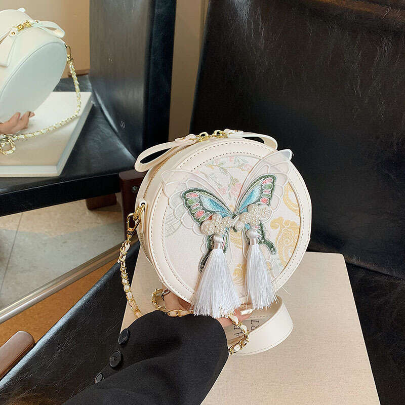 Fashionable versatile Chinese style small for women's 2024 autumn and winter new butterfly knot round cake texture chain shoulder bag
