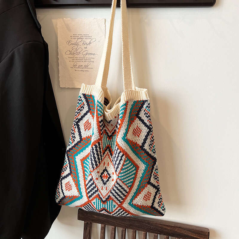 Lazy knitted yarn shoulder for women, 2024 autumn new item, ethnic style artistic versatile hand-held tote bag