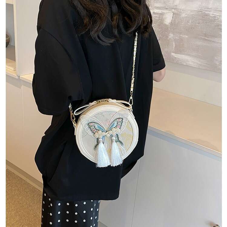 Fashionable versatile Chinese style small for women's 2024 autumn and winter new butterfly knot round cake texture chain shoulder bag