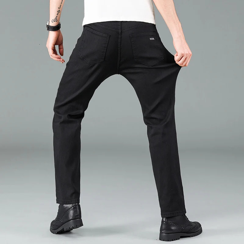Mens pure black jeans Korean version trendy straight fit pants mens comfortable and elastic classic business 241111
