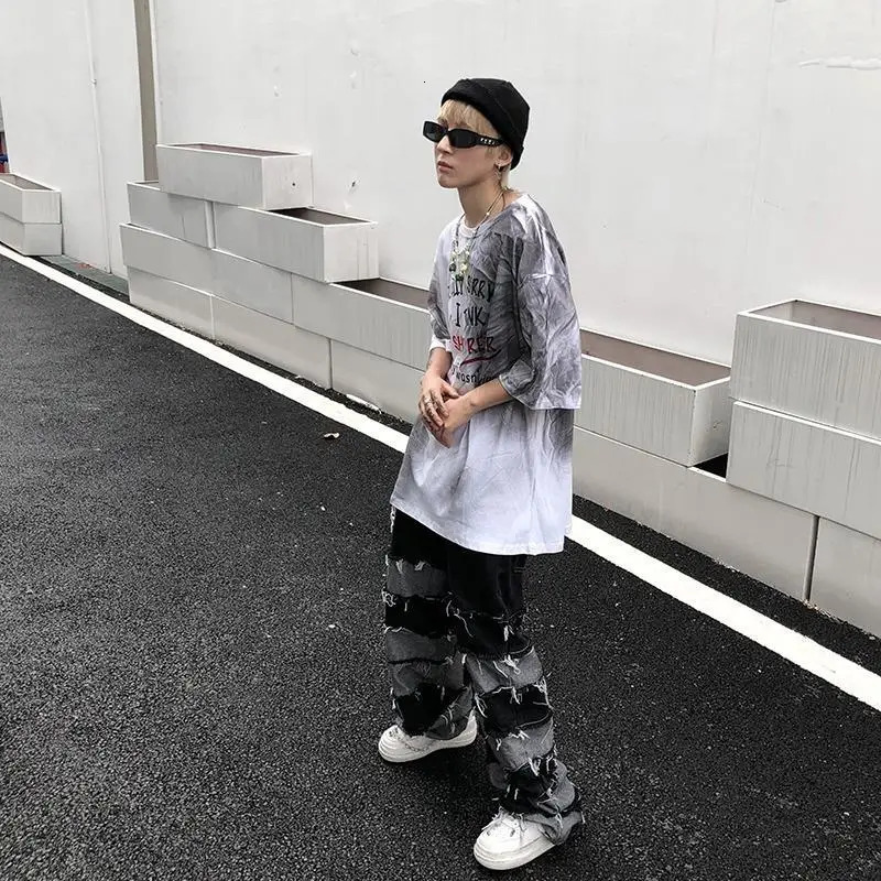 Mens oversized retro patch work style hip-hop wide leg denim pants with torn pockets Distressed jeans Y2K Grunge mens streetwear 241108