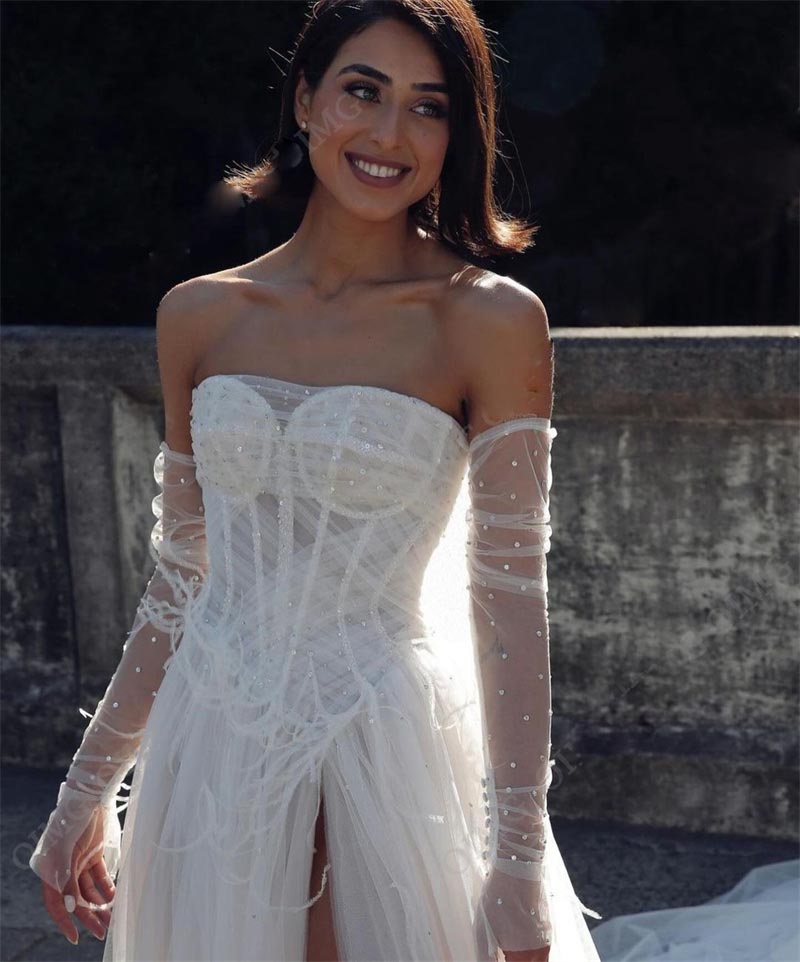Modest Strapless A Line Wedding Dresses for Bride Illusion Thigh Split Beach Wedding Gown Beaded Sequin Ruched Boho Bridal Dress with Long Sleeve