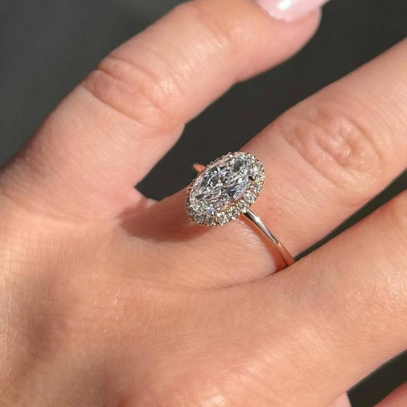 10.00 x 7.00 MM Colorless Oval Cut Moissanite Halo Ring Sterg Sier gorgeous