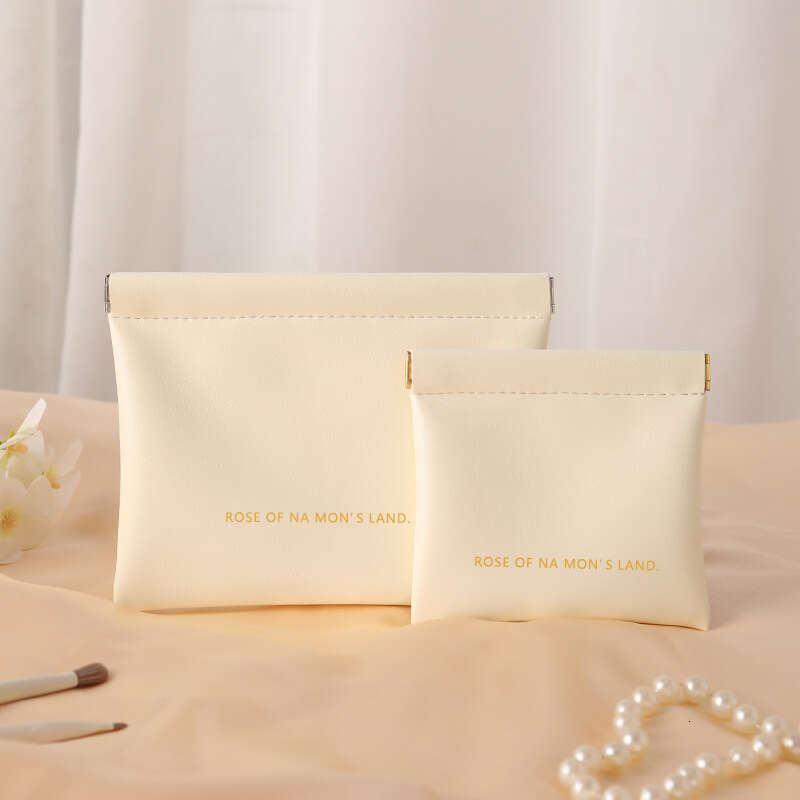 Fragment with automatic closure, wired earphone storage bag, PU zero wallet, mini portable lipstick and makeup bag