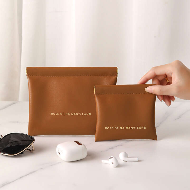 Fragment with automatic closure, wired earphone storage bag, PU zero wallet, mini portable lipstick and makeup bag