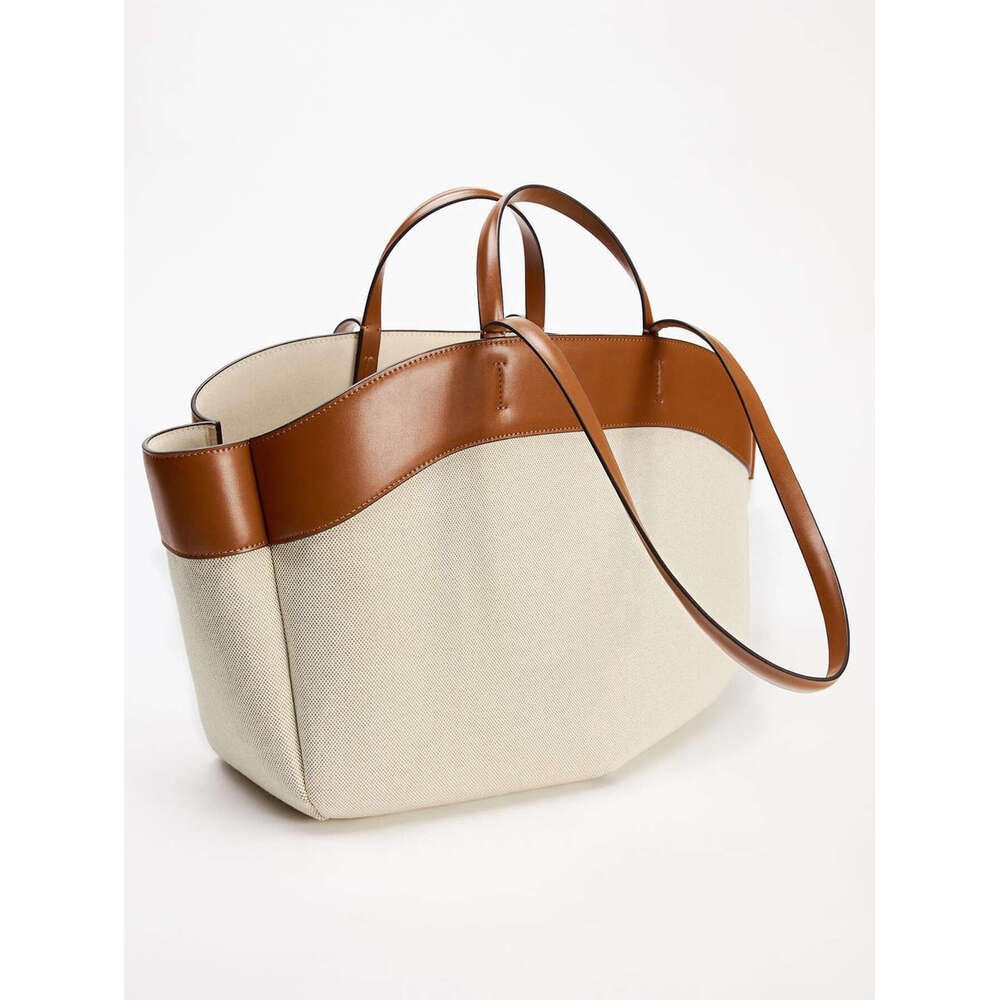 Canvas Women 2024 new fashion splicing large capacity commuter shopping hand bill shoulder tote bag